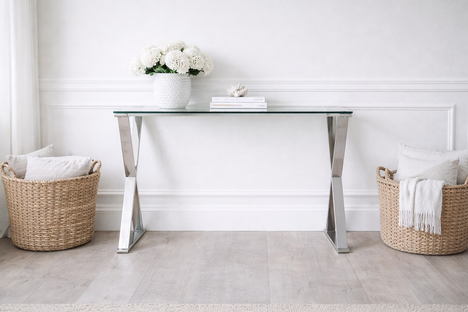 Designed for modern Hamptons-style homes, the Kensington console table combines a sleek glass surface with timeless metallic detailing